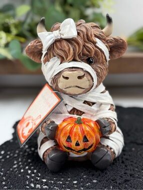 viral hallow home mummy highland cow with jack o lantern resin figurine